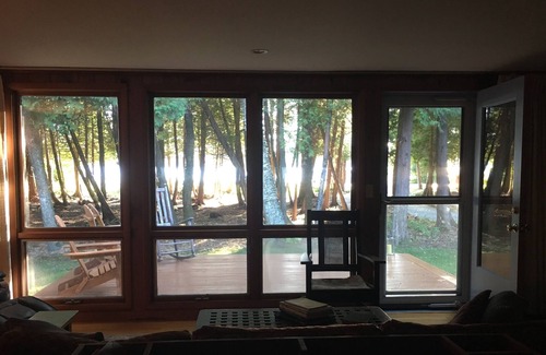 Leland House | Top of North Lake Leelanau - Secluded Lake Cottage w/ dock & sandy bottom