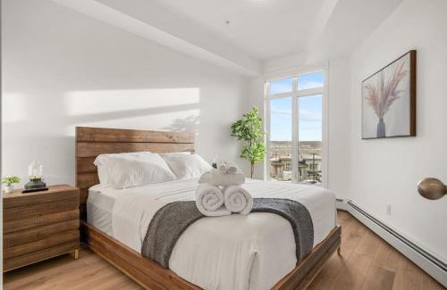 Springbank Hill Apartment | Top Rated Luxury Stay with Free Banff Access, BBQ, Netflix, Patio Dining, Sleeps 4