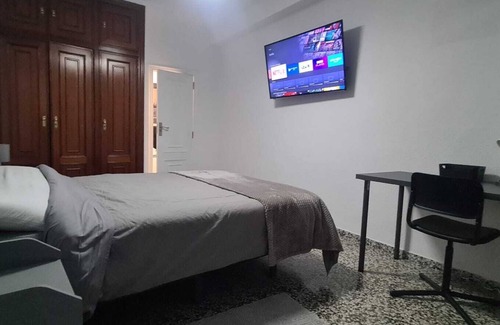 Lliria House | Town House with roof terrace and stunning views. Close to all local amenities