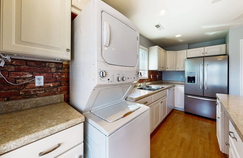 Cedar Neck House | Town of Ocean View canal-front home with dock, kayaks, balconies, grill, & AC