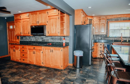 Joplin House | Townhome with Botanical Garden, Pond, Pool Access, Arcade, and Theater