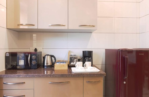 Sushant Lok Apartment | Tranquil 2BR Oasis with Balcony Bathtub