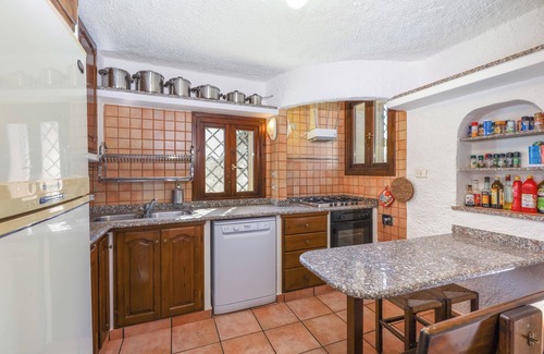 Tiriddo Apartment | Tranquil Apartment "Leccio" on the Beach with Terrace, Garden & Wi-Fi