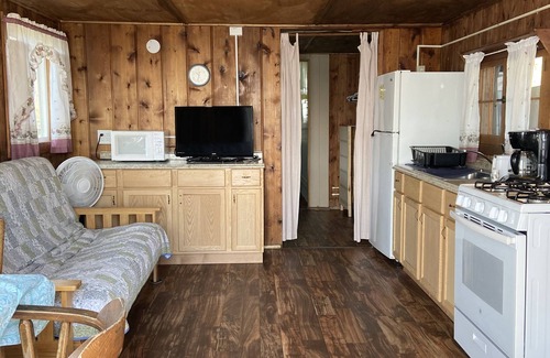 West Branch Cabin | Tranquil Cabin Retreat: Stunning Lake Views and Abundant Recreation