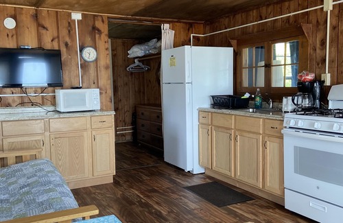 West Branch Cabin | Tranquil Cabin Retreat: Stunning Lake Views and Abundant Recreation