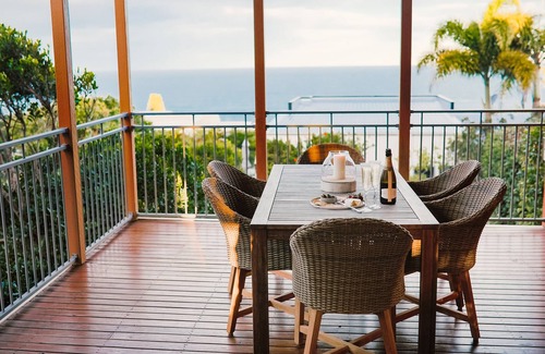 Sunrise Beach Apartment | Tranquil Treetop Retreat with Pool and Ocean Views