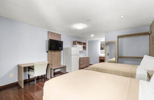 Humble Hotel | Travel Inn & Suites
