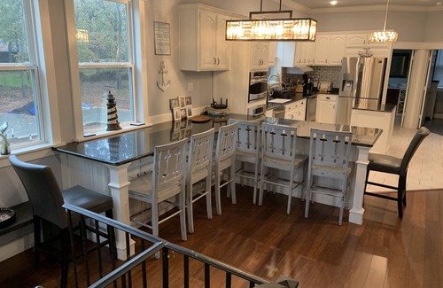 Pottsboro House | Tree Top Lake Views with lake access for swimming fishing boating 250 ft away!