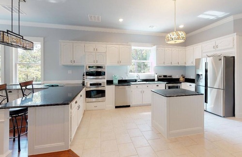 Pottsboro House | Tree Top Lake Views with lake access for swimming fishing boating 250 ft away!