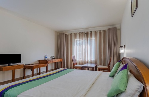 Kannur Hotel | Treebo Sadhoo Heritage