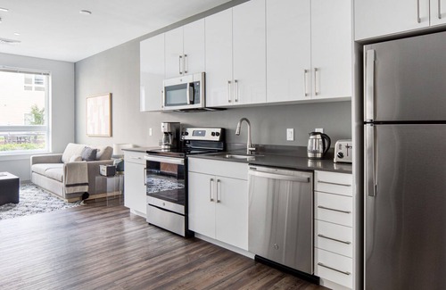 St. Elizabeth's Apartment | Trendy Brighton 1BR w/W/D, Gym, near T, Shops + Dining, by Blueground