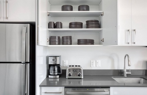 St. Elizabeth's Apartment | Trendy Brighton 1BR w/W/D, Gym, near T, Shops + Dining, by Blueground