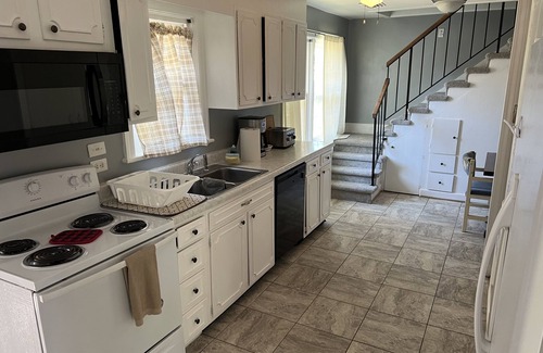 Norfolk House | Tri - Level Residential Home; Pet Friendly, Wifi, Off Street Parking 4 Bedroom Home by RedAwning