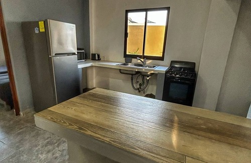Barra de Navidad Apartment | Triton Apartment, ground floor and pool