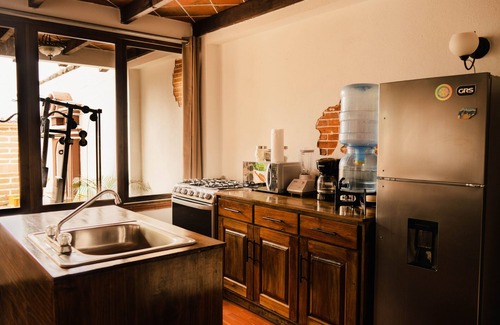 San Pedro La Laguna Villa | Tropical Oasis with Jacuzzi - Lush Garden and Lake View