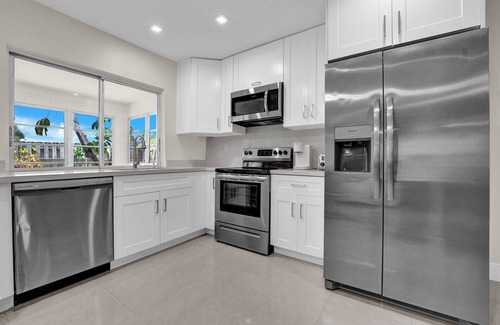 Tamarac House | Tropical Poolside Retreat in Tamarac - Lots of Activities!