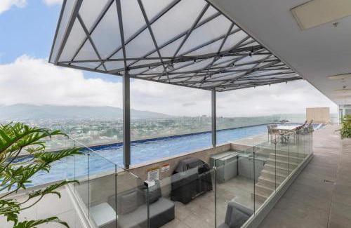 Curridabat Apartment | Tropical Vista iFreses, 2nd floor! AC, TV and Pool