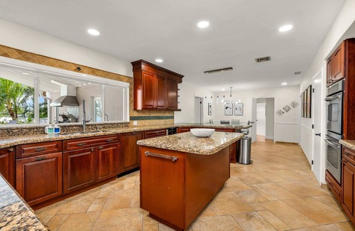 Ojus House | Tropical Waterfront Family Oasis - Heated Pool - Near the Beach & Aventura Mall!