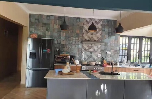 Moshi Apartment | Tulivu Escape: Room 1