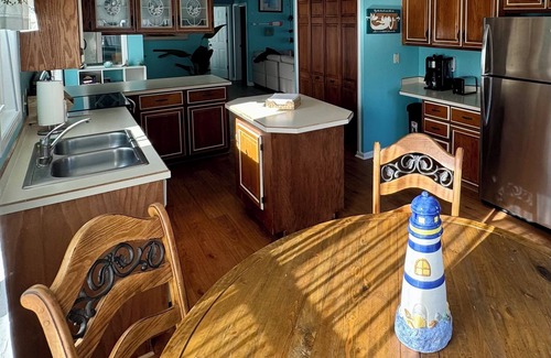 Fentress House | Tulls Bay Getaway - deep water canal location perfect for boating and relaxing!