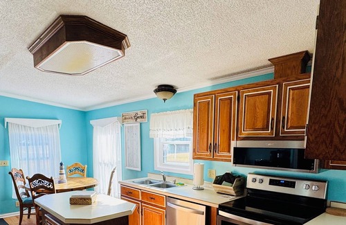 Fentress House | Tulls Bay Getaway - deep water canal location perfect for boating and relaxing!