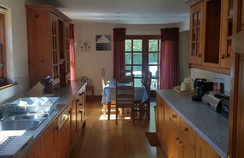 Benderloch House | Tunnag cottage is around 10 mins walk to a Beautiful Tralee beach