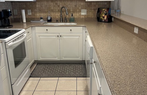 Garden City Villa | Tupelo Bay Luxury Condo 1 Mile From The Beach, minutes from the Airport.