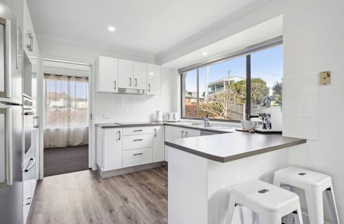 Corindi Beach Apartment | Turtle Lane, steps to the beach, pet-friendly, family beach house.