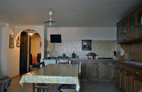 Sant'Antioco Villa | Two adjoining apartments sleeps 8/10, veranda, barbecue and olive garden