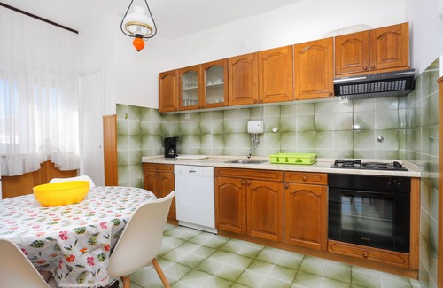 Seget Vranjica Apartment | Two bedroom apartment with terrace and sea view Seget Vranjica, Trogir (A-18487-c)