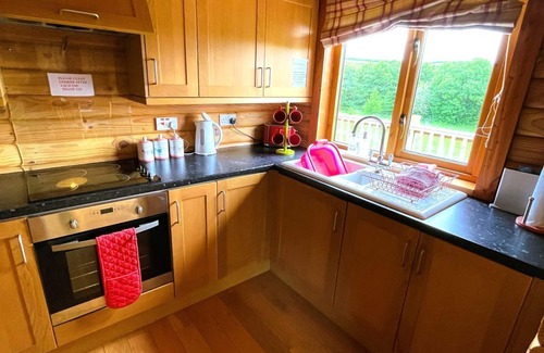 Aberchirder House | Two bedroom logcabin with spectacular view and private balcony