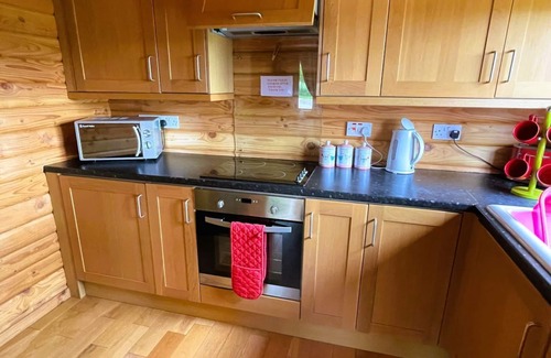 Aberchirder House | Two bedroom logcabin with spectacular view and private balcony