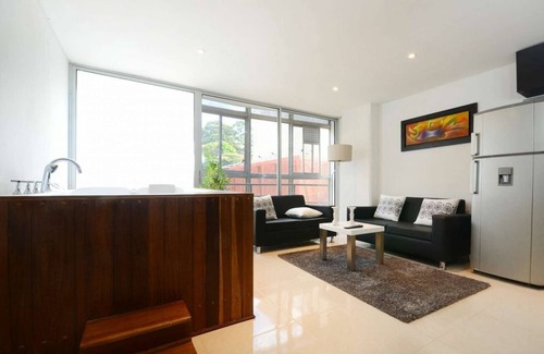 Zona Rosa Apartment | Two Bedroom Middle of Park lleras AC, Hot tub Bars downstairs