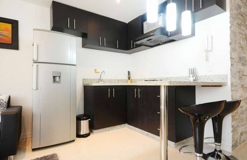 Zona Rosa Apartment | Two Bedroom Middle of Park lleras AC, Hot tub Bars downstairs