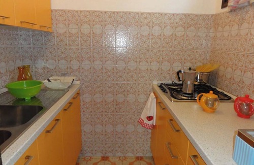 Bibione House | Two-story townhouse with private garden