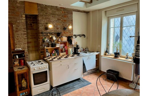 Revin House | typical center house with garden