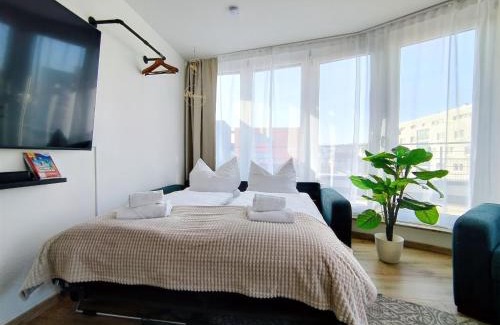Ulm Apartment | Ulmer Penthouse für 7, Arbeitsplatz, XXL-Dachterrasse, Grill, Wii