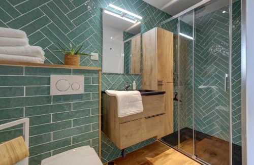 Boue House | Un nid dans la Grange - Maison avec jacuzzi et sauna