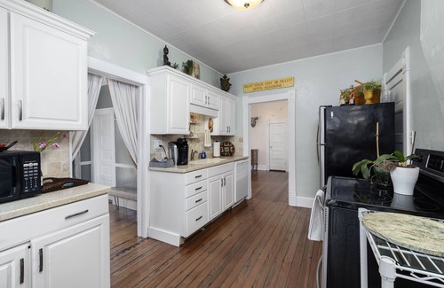 Ozark House | Unique Historic Charm ~ 5★ Location ~ Dreamy Porch Centrally Located