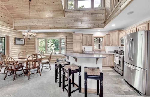 Long Lake House | Unique log cedar family vacation home with 185 feet of secluded lake frontage