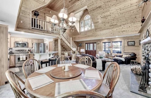 Long Lake House | Unique log cedar family vacation home with 185 feet of secluded lake frontage