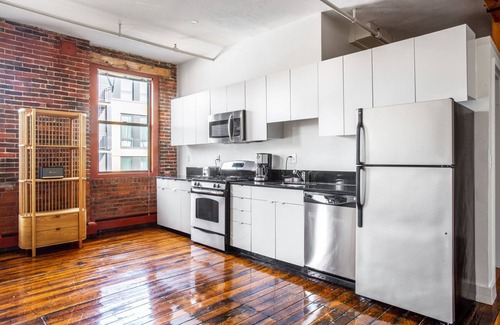 South End House | Unique South End Loft w/Pool, Art Gallery, Steps to T by Blueground