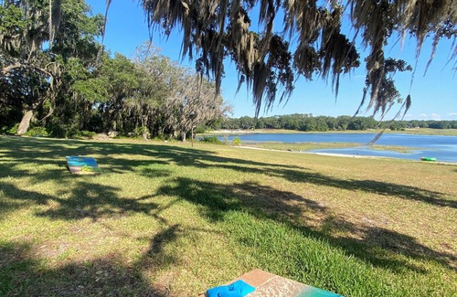 Keystone Heights House | Unique Spanish Style Lakefront Home! Kayaks and Paddle Boat!