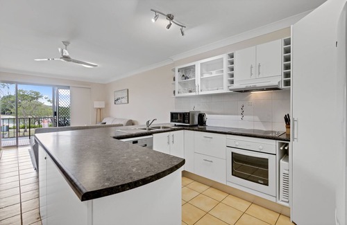 Maroochydore Apartment | Unwind by the River - Your Waterfront Holiday Oasis