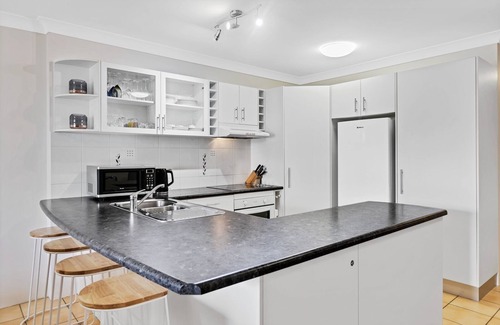 Maroochydore Apartment | Unwind by the River - Your Waterfront Holiday Oasis