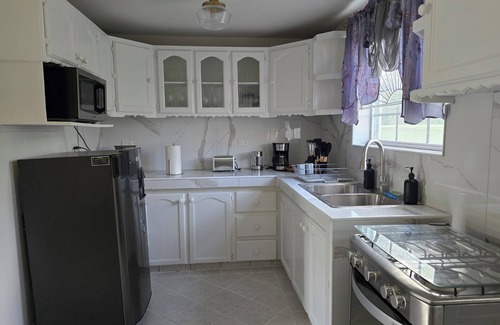 Piligrim Road Apartment | Unwind in our cozy, furnished AC 2 -bedroom unit perfect for short getaways.