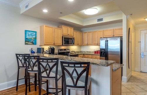 Dauphin Island Condo | UPDATED Beach Front Condo - Holiday Isle 302 - Pool, Sauna, Hot Tub, Grill, W/D