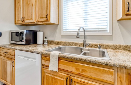 Redmond House | Updated duplex with yard, private washer/dryer, central AC, & a soaking tub