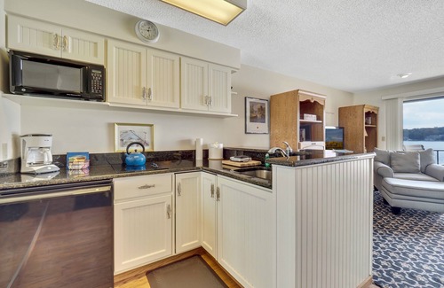 Charlevoix Condo | Upper-Level Lakeview Condo | Downtown Charlevoix | Pool, Hot Tub, Sauna