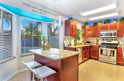 Tropic House | Urban Oasis withHot Tub, HEATED POOL and Private Movie Theater home
